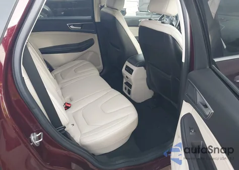 2021 Ford Edge Titanium z USA, uszkodzony, nr VIN 2FMPK4K95MBA38996